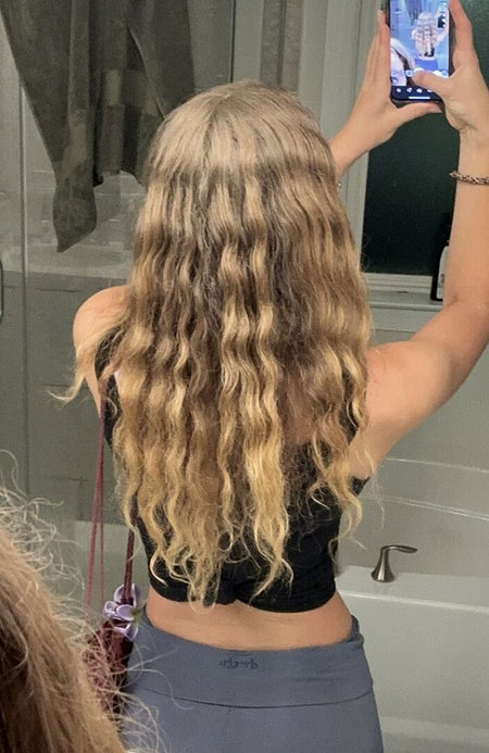 Deija's hair in the mirror
